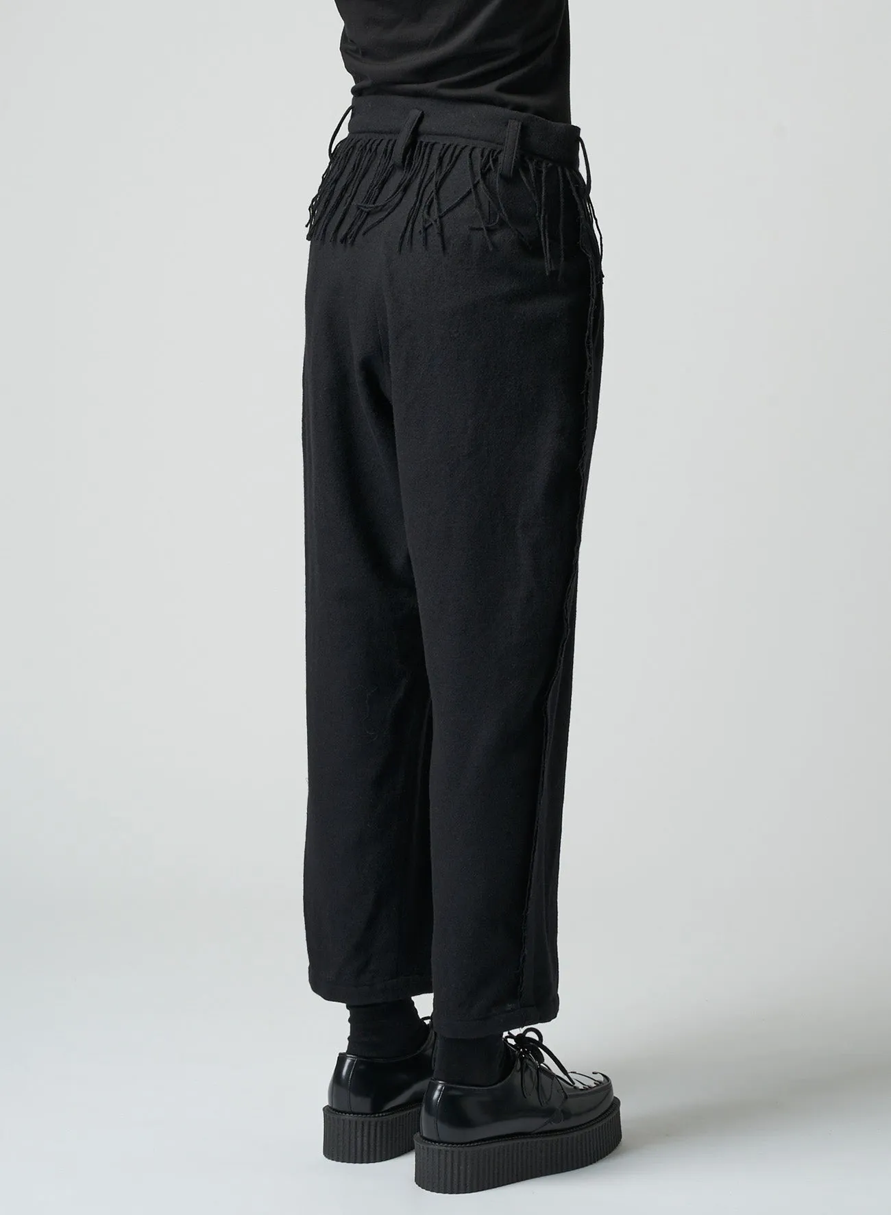 PLEATED SERGE PANTS WITH FRINGE DETAILS