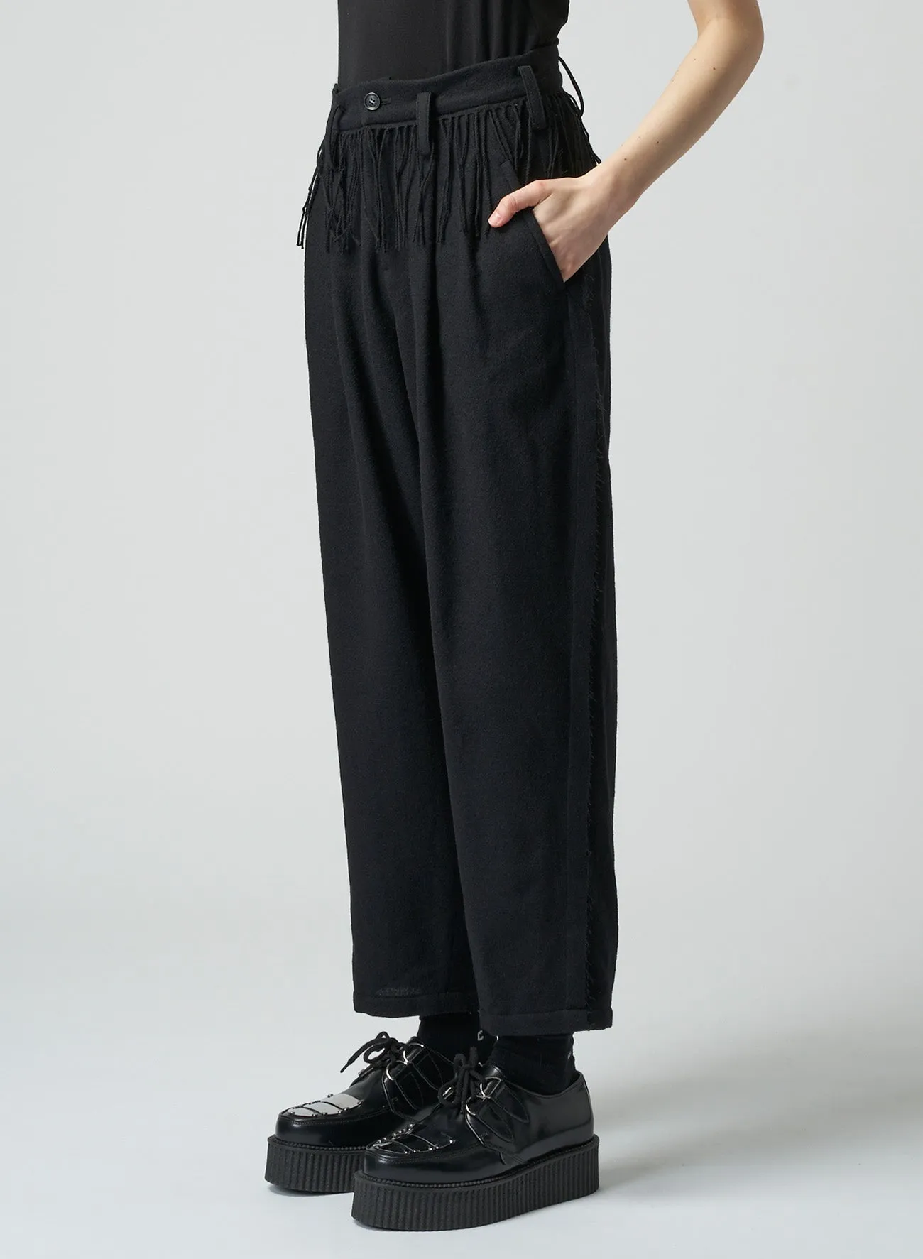 PLEATED SERGE PANTS WITH FRINGE DETAILS