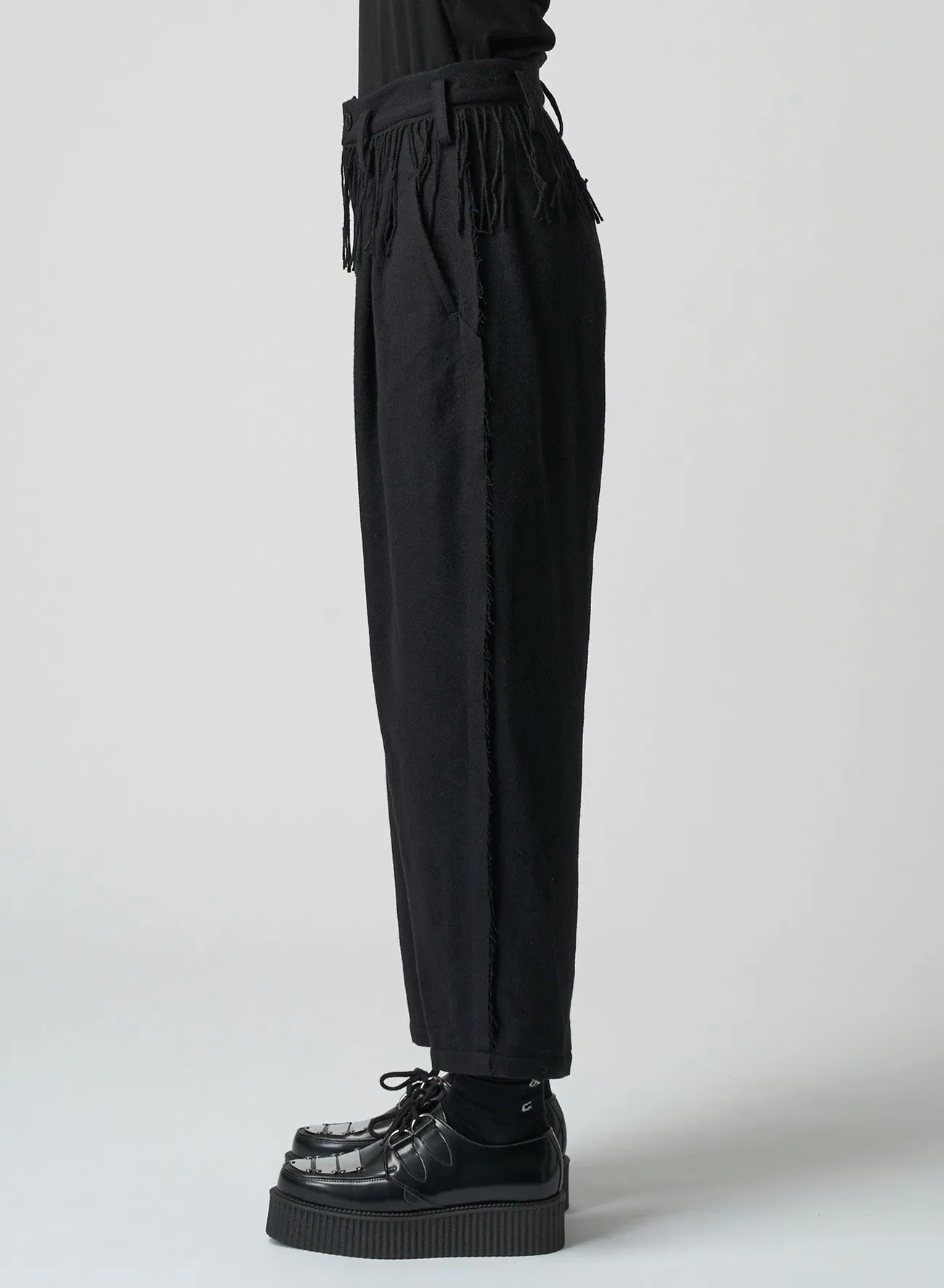 PLEATED SERGE PANTS WITH FRINGE DETAILS